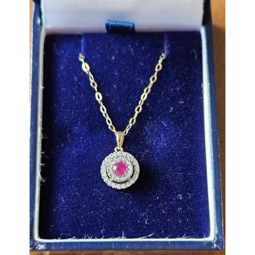 299A - A lovely 9ct Gold, Diamond and Ruby Pendant with a 9ct Gold Chain.