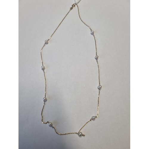 313 - A 14ct Gold and Pearl Necklace.