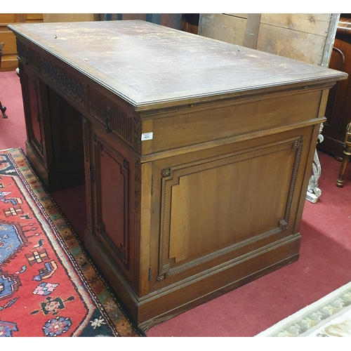 423 - Of Superb quality. A 19th Century Walnut Pedestal Desk with highly inlaid front and back with emboss... 