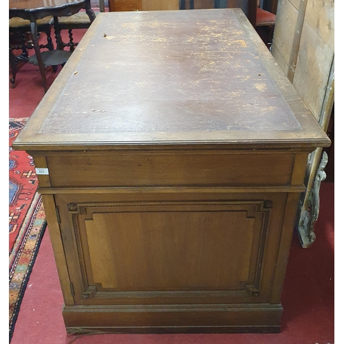 423 - Of Superb quality. A 19th Century Walnut Pedestal Desk with highly inlaid front and back with emboss... 