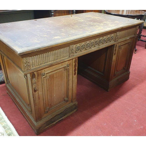 423 - Of Superb quality. A 19th Century Walnut Pedestal Desk with highly inlaid front and back with emboss... 