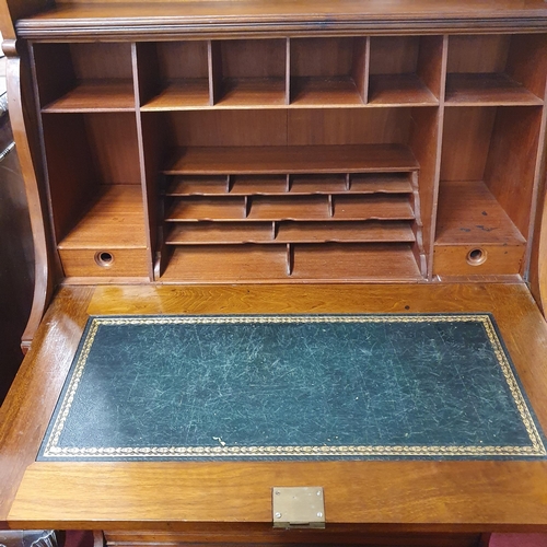 503 - An early 20th Century Art Nouveau craft style Bureau with flap front over a bank of drawers and gall... 