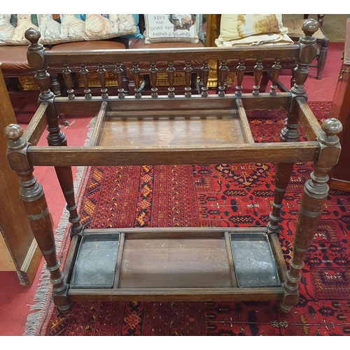 723 - A good early 20th Century Oak Stick Stand with drip tray. W 80 x D 32 x H 75 cm approx.