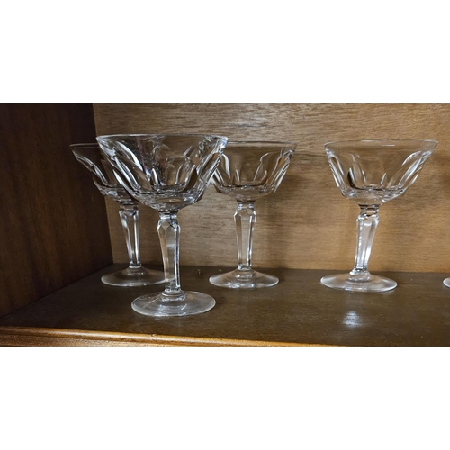 749 - A quantity of Waterford Crystal Glasses on one shelf.