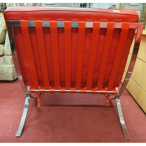 861 - A red leather Chrome frame Barcelona style Chair.
W 75 x SH 41 x BH 83 cm approx.