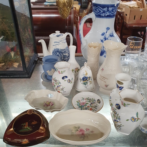 936 - A large quantity of Crystal and Porcelain to include Waterford crystal etc.