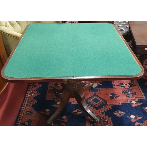 951 - Of good quality. A Regency Mahogany Foldover Card Table with brass inlay top and frieze on quatrefoi... 