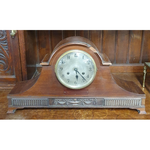 960 - A Victorian classical mantle clock in simulated black slate and marble, with eight day striking move... 