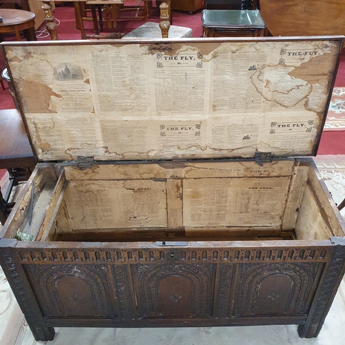 1067 - A 19th, possibly 18th Century, Elm Mule Chest with highly carved triple panelled front. 118 x 49 x H... 