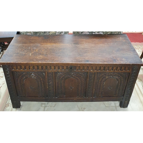 1067 - A 19th, possibly 18th Century, Elm Mule Chest with highly carved triple panelled front. 118 x 49 x H... 