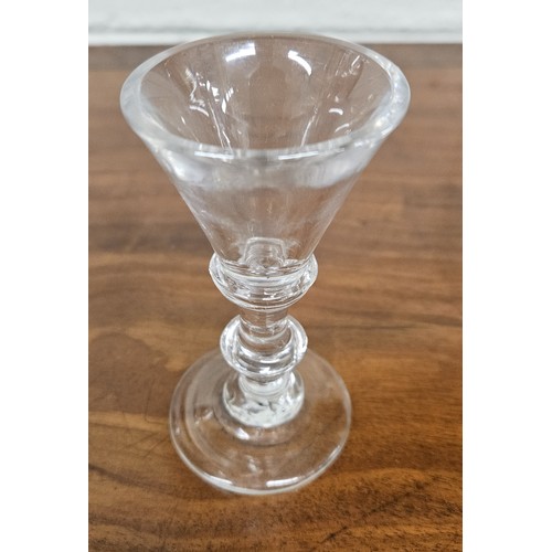 71 - An 18th Century illusion Glass, a group of Georgian Rinsers, two Bohemian Goblets, chip to bases of ... 