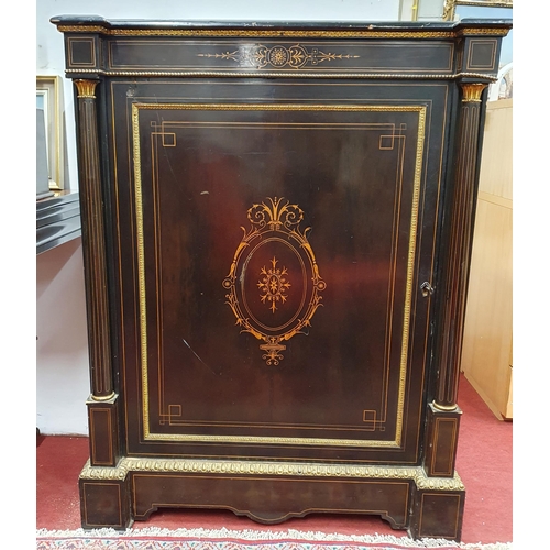 81 - Of Superb quality. A 19th Century Ebonised single door Cabinet with ormolu mounts and highly inlaid ... 