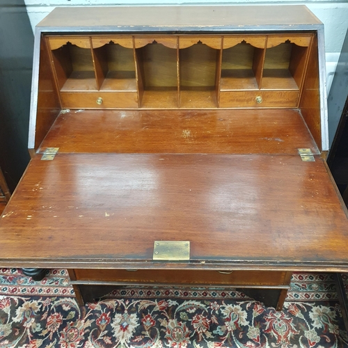 19 - An Edwardian Mahogany and Inlaid Bureau of neat proportions with shell inlay flap. W 76 x D 43 x H 9... 