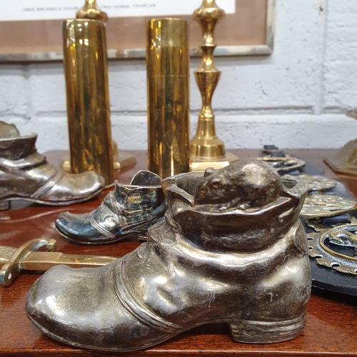 6 - A good quantity of 19th Century and later Brassware to include three candlesticks, two shell trench ... 