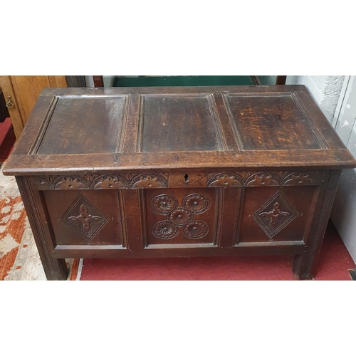 80 - An 18th Century Oak three panel Linen Chest with carved front panel. W 121 x 56 x H 66 cm approx.