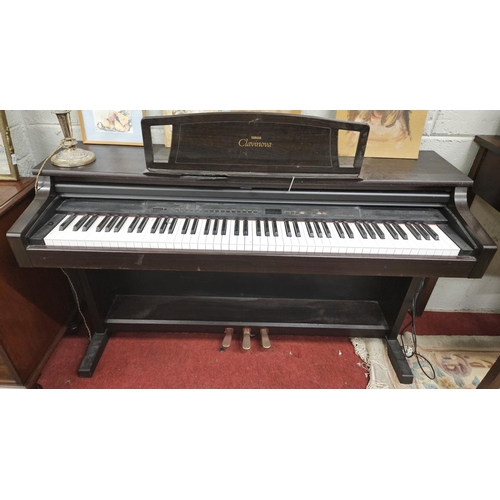 108 - A Yamaha Clavinova electric Organ.
H 86 x 143 x 52 cm approx.