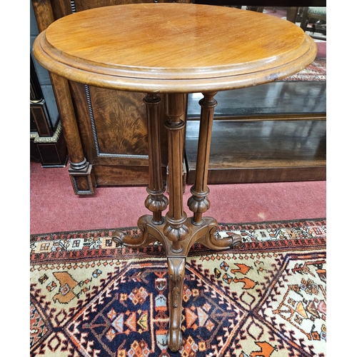 430 - A lovely 19th Century Mahogany Wine Table on triple pillar fluted supports and splayed legs. W 47 x ... 