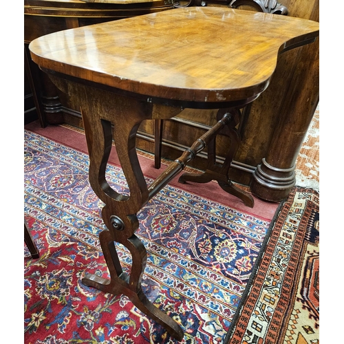 431 - A 19th Century Mahogany kidney shaped Side Table with stretcher base, pierced ends and splayed feet.... 