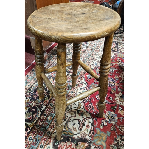 434 - A 19th Century Elm provincial Milking Stool. D 31 x 54 cm approx.