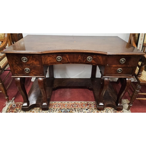 442 - A good early 19th Century kneehole Desk with concave drawered front on cabriole supports. W 123 x 57... 