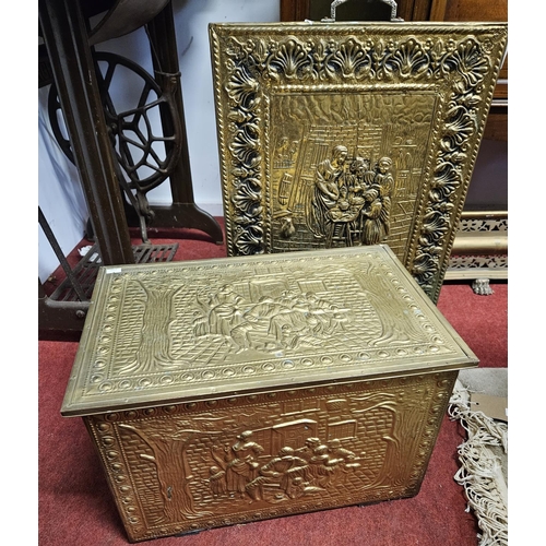 478 - Two embossed Brass Coal Bins along with a fire screen. W 46 x 30 x H 31 cm approx.