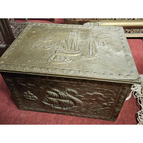 478 - Two embossed Brass Coal Bins along with a fire screen. W 46 x 30 x H 31 cm approx.