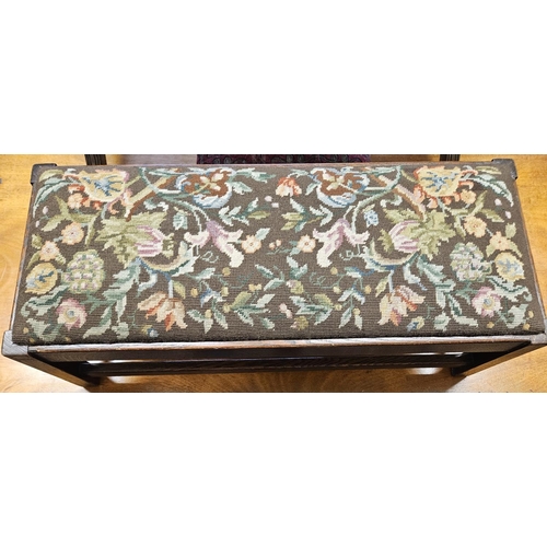 488 - An early 20th Century Oak Footstool with tapestry seated top on square supports. W 78 x 32 x H 24 cm... 