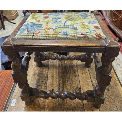 493 - An early 20th Century Oak rectangular Footstool with barley twist supports. W 41 x 31 x H 42 cm appr... 