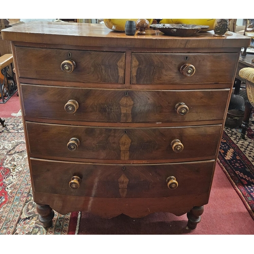 607 - A Victorian Mahogany bow fronted Chest of Drawers of neat proportions with original turned timber kn... 