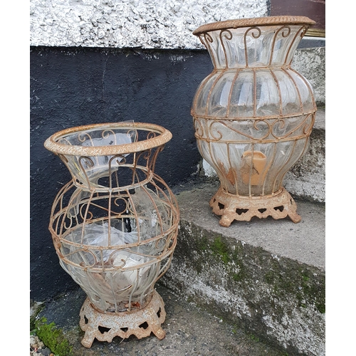 1098 - A Pair of Metal and Glass Garden Lanterns. 
(damage to one).  H 47 cm approx.