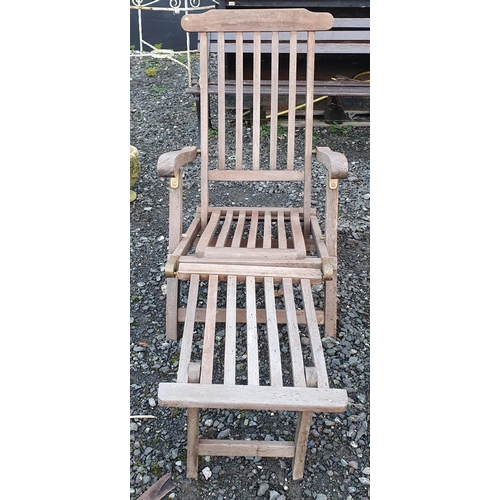 1100 - A Teak Garden Seat/Lounger. Along with 2 parasol bases. H 90 x 57 x 80 cm approx.