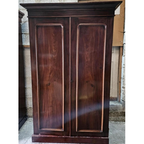 1113 - A 19th Century Mahogany two door Wardrobe with two interior drawers and shoe box.  H 205 x 130 x 60 ... 