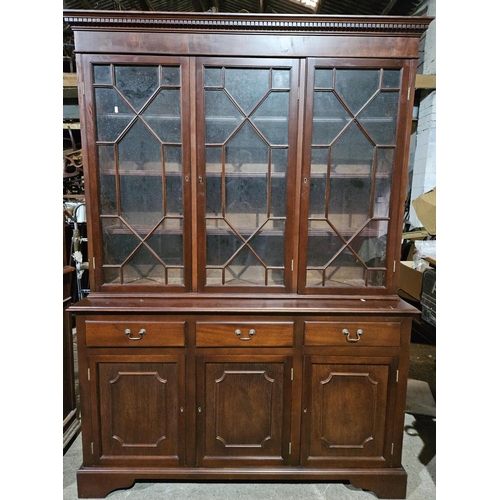 1121 - A Large Mahogany Modern Bookcase with astragal glazed doors. H 114 x 153 x 47 cm approx.