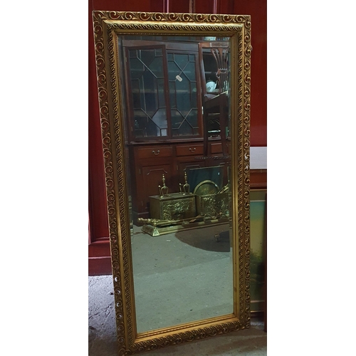 1151 - A Good Rectangular Bevelled Mirror in a Gilt Frame. H 138 x 60 cm approx.