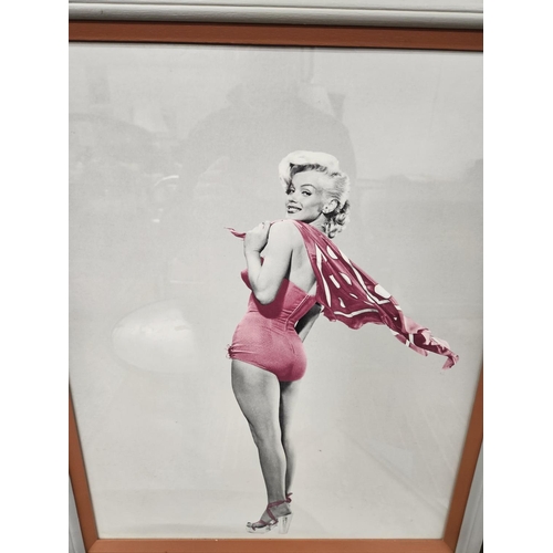 103 - A coloured Photograph of Marilyn Monroe. 48 x 58 cm approx.