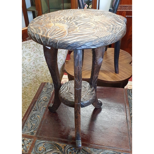 499 - A late 19th early 20th Century carved Stool/Table. 29 x 45 cm approx.