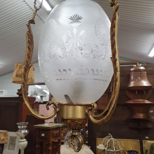 518A - A lovely pair of early 20th Century hanging Lights with etched glass shades.