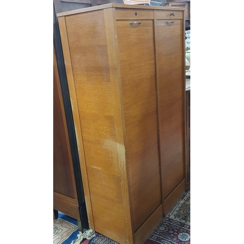 528 - An early to mid 20th Century Timber double fronted Filing Cabinet with tambour door front. W 84 x 40... 