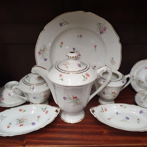 529A - A Fantastic Limoges Dinner Service with floral pattern outline and gilded banding. Approx. 70 pieces... 