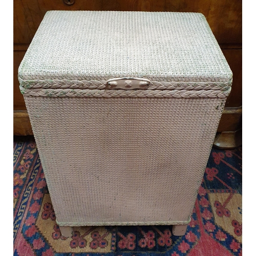 537A - A blue Lloyd Loom Bedside Cabinet with single door front along with a pink linen bin.