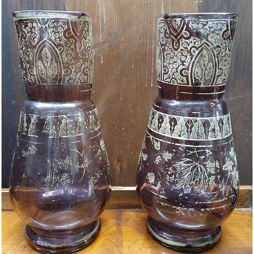 546 - A Blue ground Garniture Urn set along with a pair of Purple ground glass Vases.