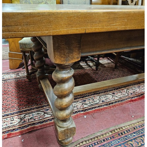 521 - A Magnificent very heavy 20th Century solid Walnut Kitchen Table on barley twist supports and stretc... 