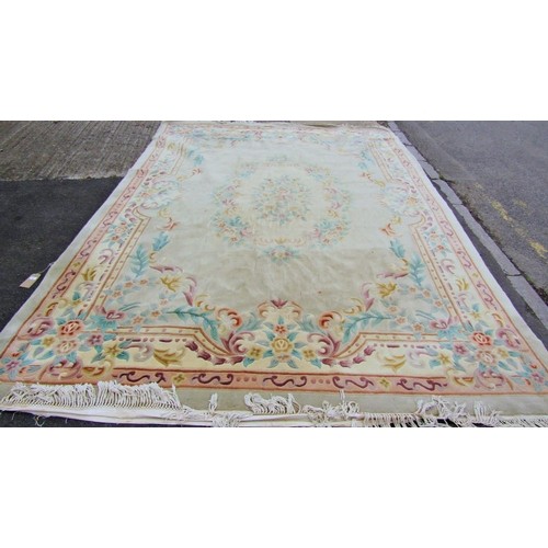 483 - A good green ground Carpet with multi borders and allover floral decoration. 385 x 272 cm approx.