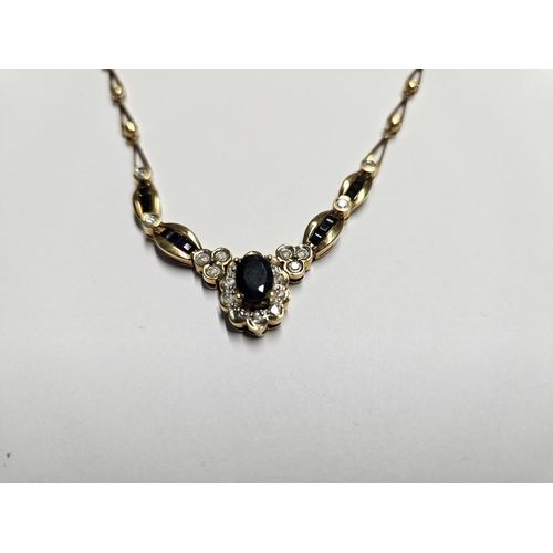 201 - A fabulous 18ct Gold, Diamond and Sapphire Necklace, total weight approx 18 gms.