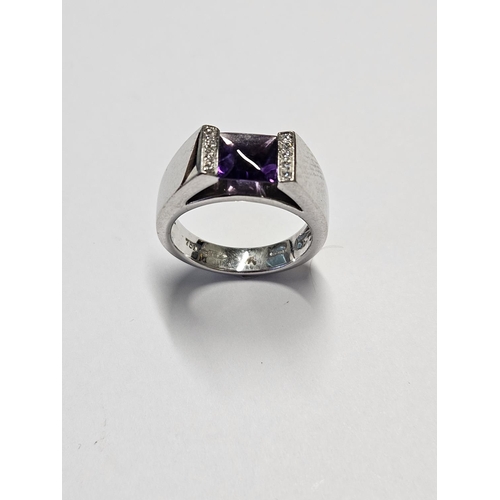 208 - An 18ct Gold, Diamond and Amethyst Ring, size M total ring weight 9.5 gms.