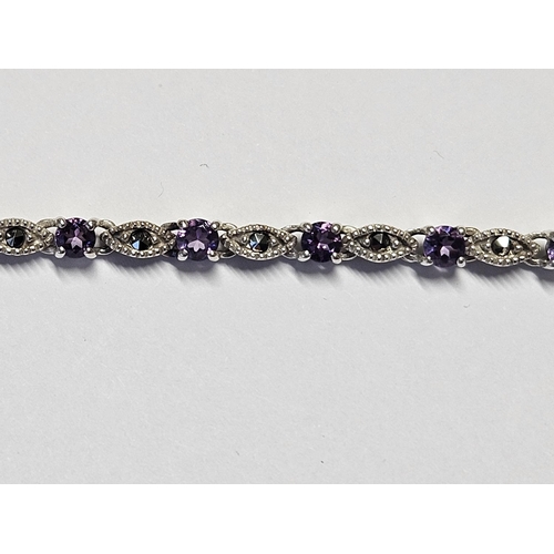 210 - A Silver Amethyst set Bracelet.