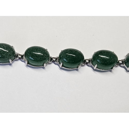 218 - A Silver and gem set Bracelet.