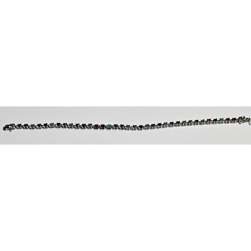 229 - A Silver and Gem set tennis Bracelet.