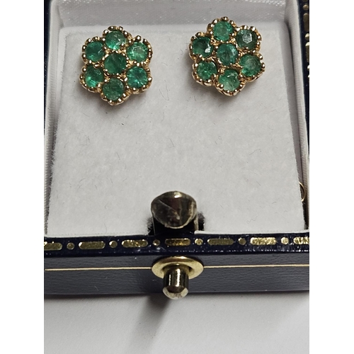 233 - A pair of 9ct Gold and Emerald Earrings.