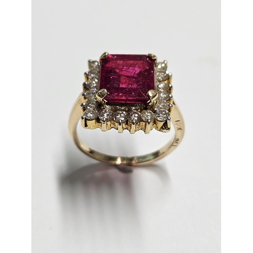 236 - An 18ct Gild, Diamond and Gem set cluster Ring, size I.